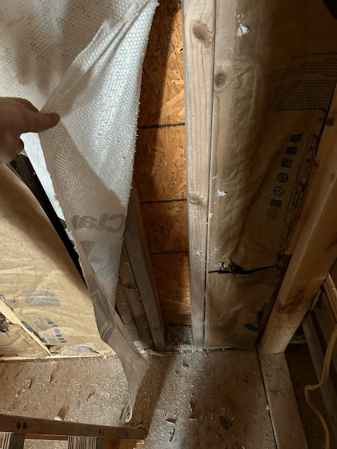 Insulation missing between studs in several places. Discovered by removing drywall to fix the electrical.